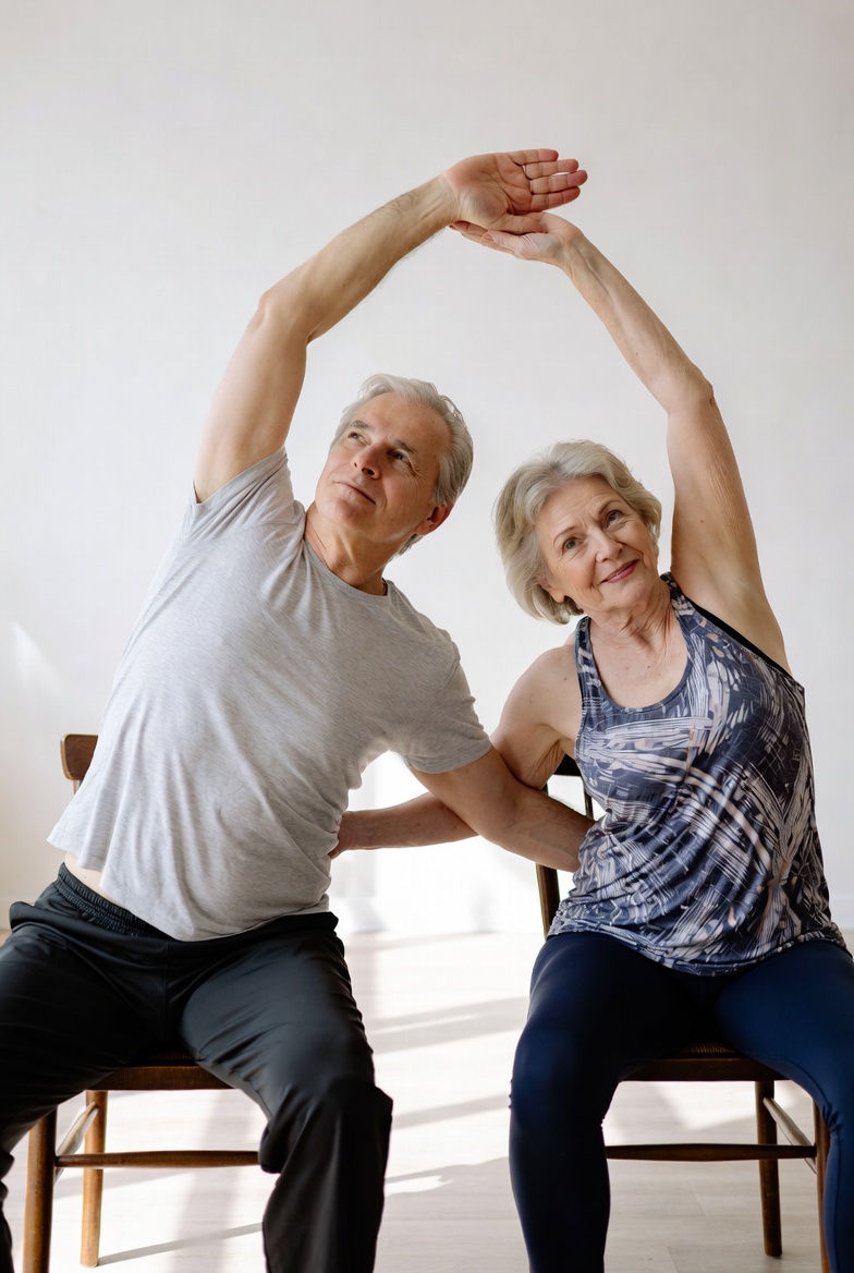 Gentle Side Stretch Seated - partner yoga for seniors